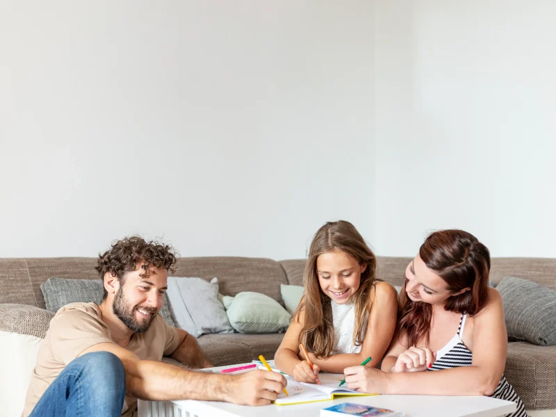 family-having-fun-coloring-together